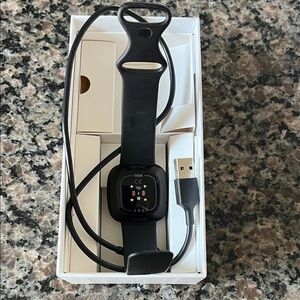Fitbit Smartwatch in Black with Charger